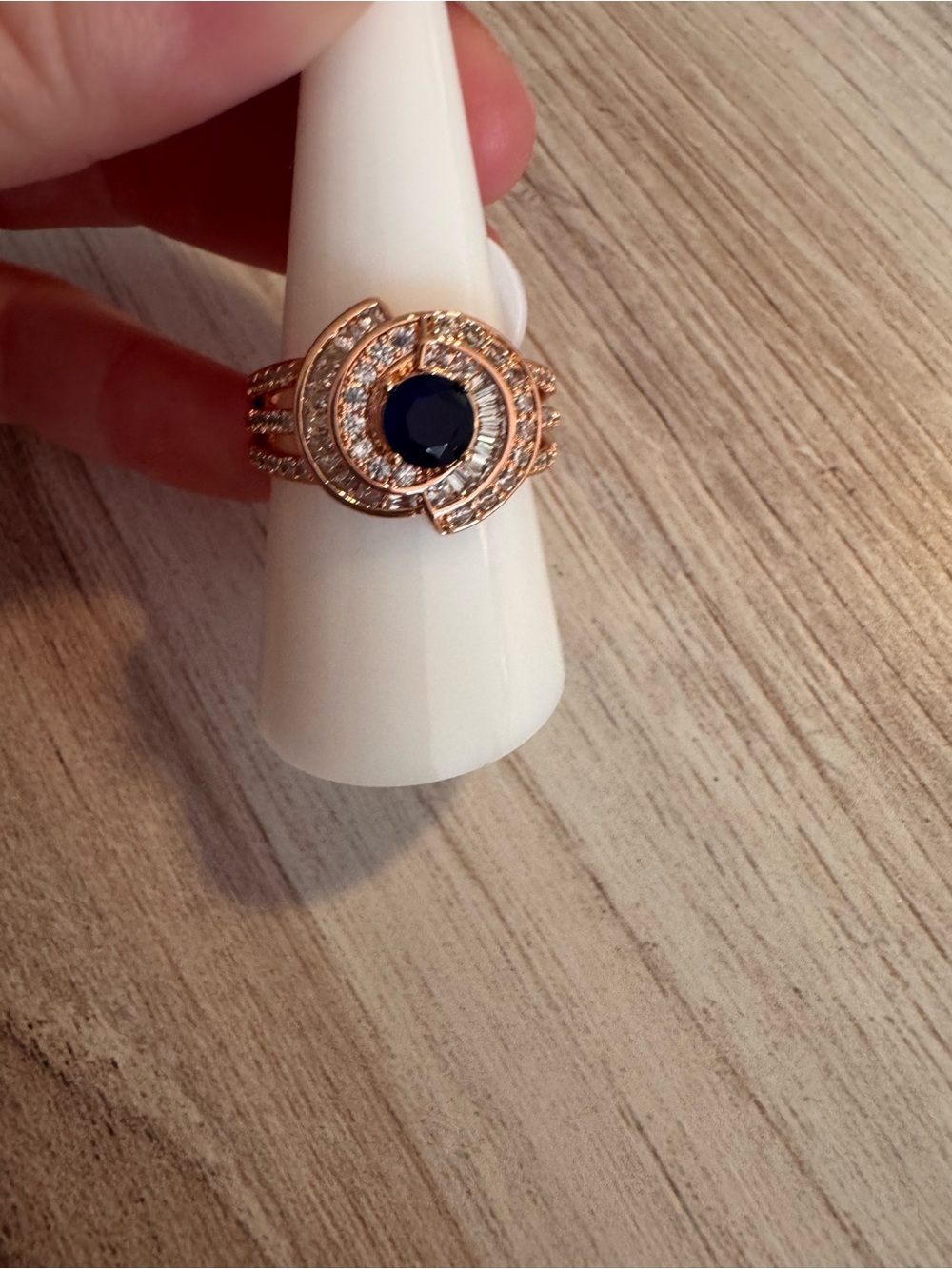 Rose Gold Ring with Deep Blue Center Stone and Pavé Accents